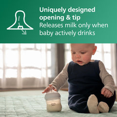 Philips Avent bottle held in hand to show compact scale and grip benefit