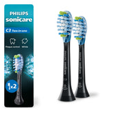 Philips Sonicare front packaging showing two black replacement brush heads and benefits