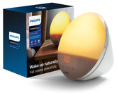 Philips wake-up light front view showing colored sunrise effect and benefit gentle wake-ups