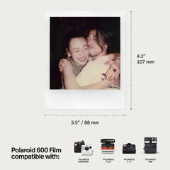 Polaroid film held in hand for scale showing brand and portable instant photo benefit