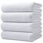 POLYTE folded waffle towel front view showing neat compact storage and soft feel