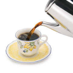 Presto percolator beside a mug for size comparison and household portion guidance