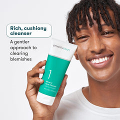 Proactiv cleanser in hand size comparison illustrating 6 oz portable travel-friendly benefit