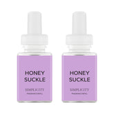Pura honeysuckle front packaging showing two refill vials and benefits