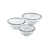 Pyrex front view showing three glass bowls and compact packaging, durable and versatile