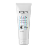Redken front bottle view showing product packaging and quick treatment benefit