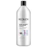 Redken front packaging shows conditioner bottle and brand for easy identification