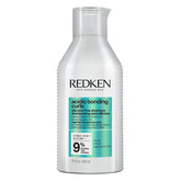 Redken bottle front packaging showing product and defined curl benefit