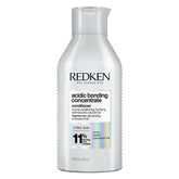Redken bottle front packaging showing product and professional benefit