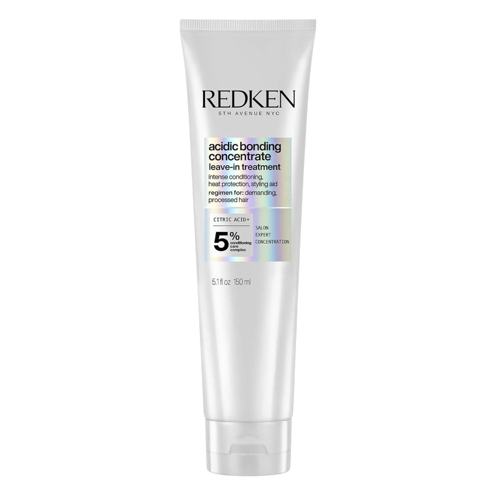 Redken front bottle view showing leave-in conditioner and its restorative benefit