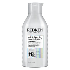 Redken bottle front packaging showing product and professional benefit