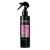 Redken bottle front packaging showing product and salon-grade benefit