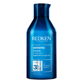 Redken Extreme shampoo front bottle showing packaging and professional-strength benefit