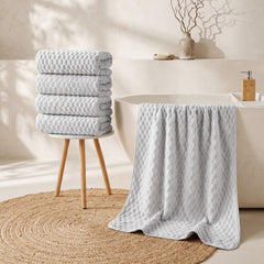REDKISS towel size compared to person showing extra-large fit