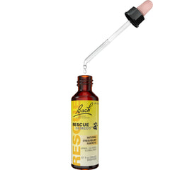 RESCUE drops being added to pet food bowl demonstrating easy, stress-free dosing