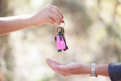 RESQME held in hand to show compact size and easy carry