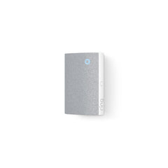 Ring Chime held in hand to show scale and portability for flexible placement