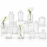 RUCKAE front view of 12 clear vases showing vintage style and easy table use
