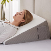 Ruqmuis wedge pillow front view showing triangular support and firm elevation benefit