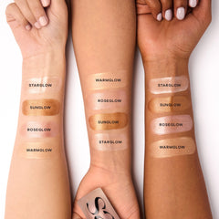 Saie Glowy Super Gel Starglow applied on cheek highlighting dewy, illuminated skin finish without heavy glitter
