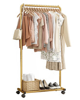 Sakugi front view of gold clothes rack showing stable frame and storage benefit