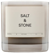 Salt & Stone candle front glass jar showing clean minimalist design and warm scent