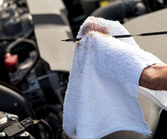 S&T INC. towel buffing stainless steel appliance showing gentle polishing advantage