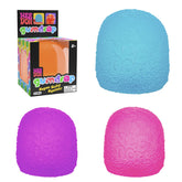 Schylling NeeDoh Gumdrop front view showing bright neon color and shape, playful desk accessory