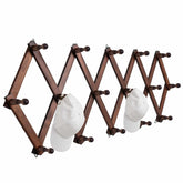 SCUNDA front view wall hat rack showing 16 hooks and brown finish for organized storage