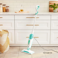 Shark S1000 swivel head angled under furniture for improved maneuverability