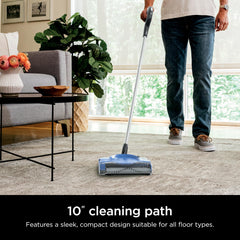 Shark V2700Z swivel head navigating around furniture for precise cleaning