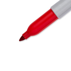 Sharpie fine-tip red mark on plastic container showing water-resistant benefit