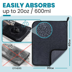 Shiny Bath towel absorbing water on shower glass for streak-free finish