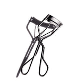 Shiseido eyelash curler front view showing clean design and reliable curl