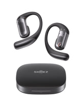 SHOKZ OpenFit Pro front view showing earbuds and charging case, highlighting portability