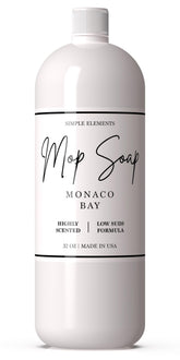 SIMPLE ELEMENTS bottle front label showing Monaco Bay scent and easy dosing benefit