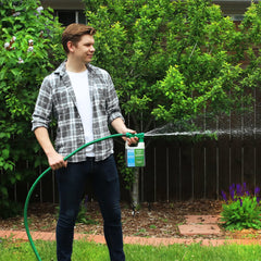 Simple Lawn Solutions being sprayed onto turf for even nutrient coverage