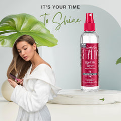 Simply Stylin' misting onto hair demonstrating easy application and detangling