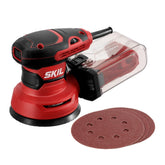 Skil front view of 5" sander showing compact body and pad, clear dust control benefit