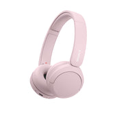 Sony WH-CH520 front view in pink showing sleek on-ear design and portability