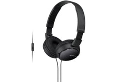 Sony headphones beside backpack showing compact scale and travel-friendly benefit