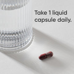 Sports Research capsule next to coin to show size and convenient daily dose