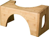 Squatty Potty bamboo flip stool front view shows stable platform and warm finish