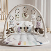 STACTCUTE front view activity gym showing toy arch and colorful mat, encourages play