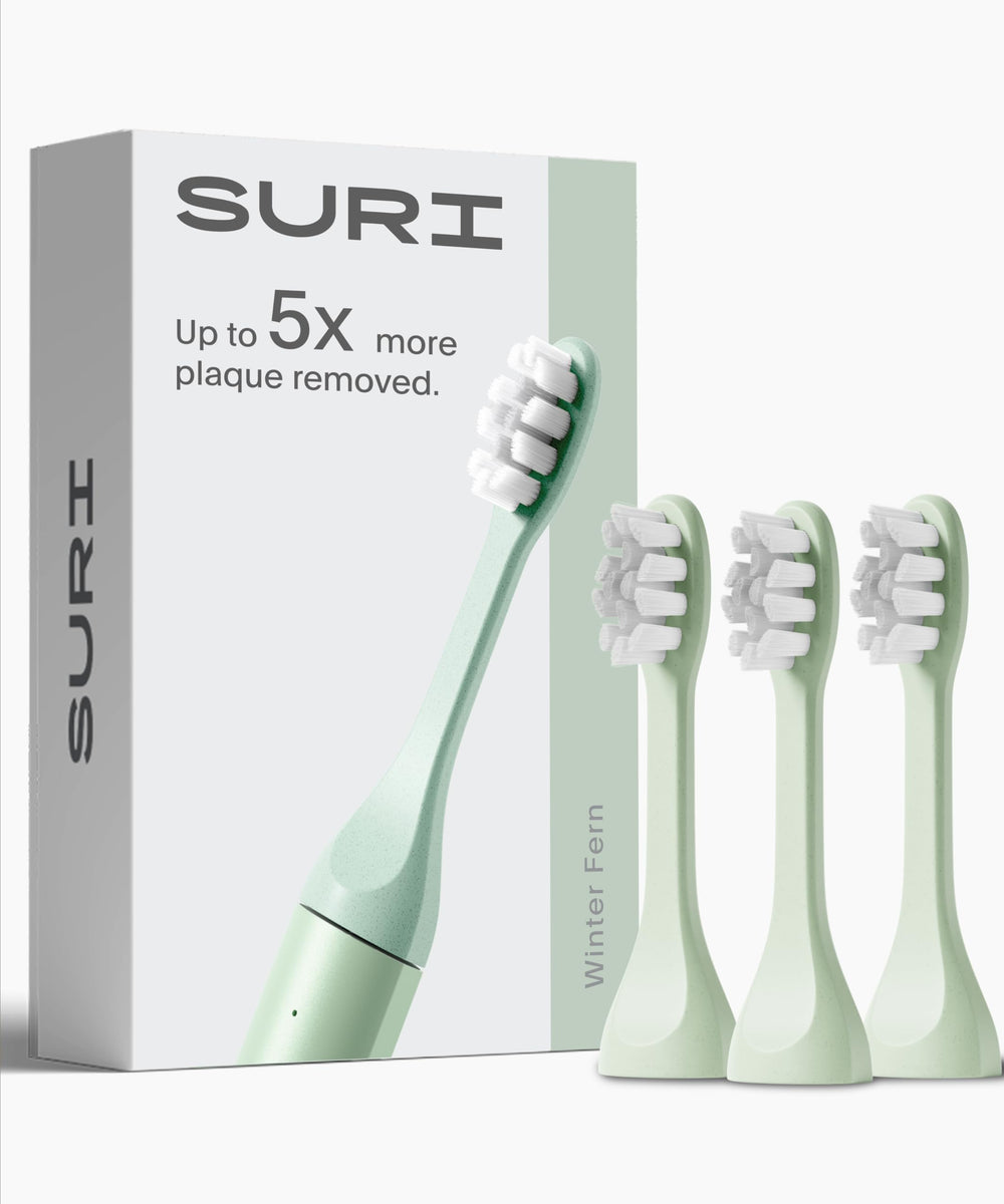 SURI front packaging Winter Fern showing three replacement heads and recycling note