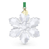 Swarovski ornament front view showing geometric snowflake and sparkle benefit