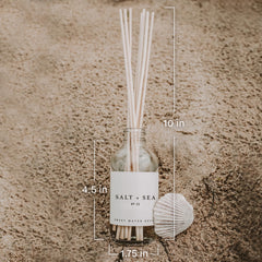 Sweet Water Decor diffuser on bathroom counter creating a calming scent