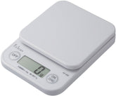 Tanita KF-200 front view showing compact white scale and clear display for accurate weighing