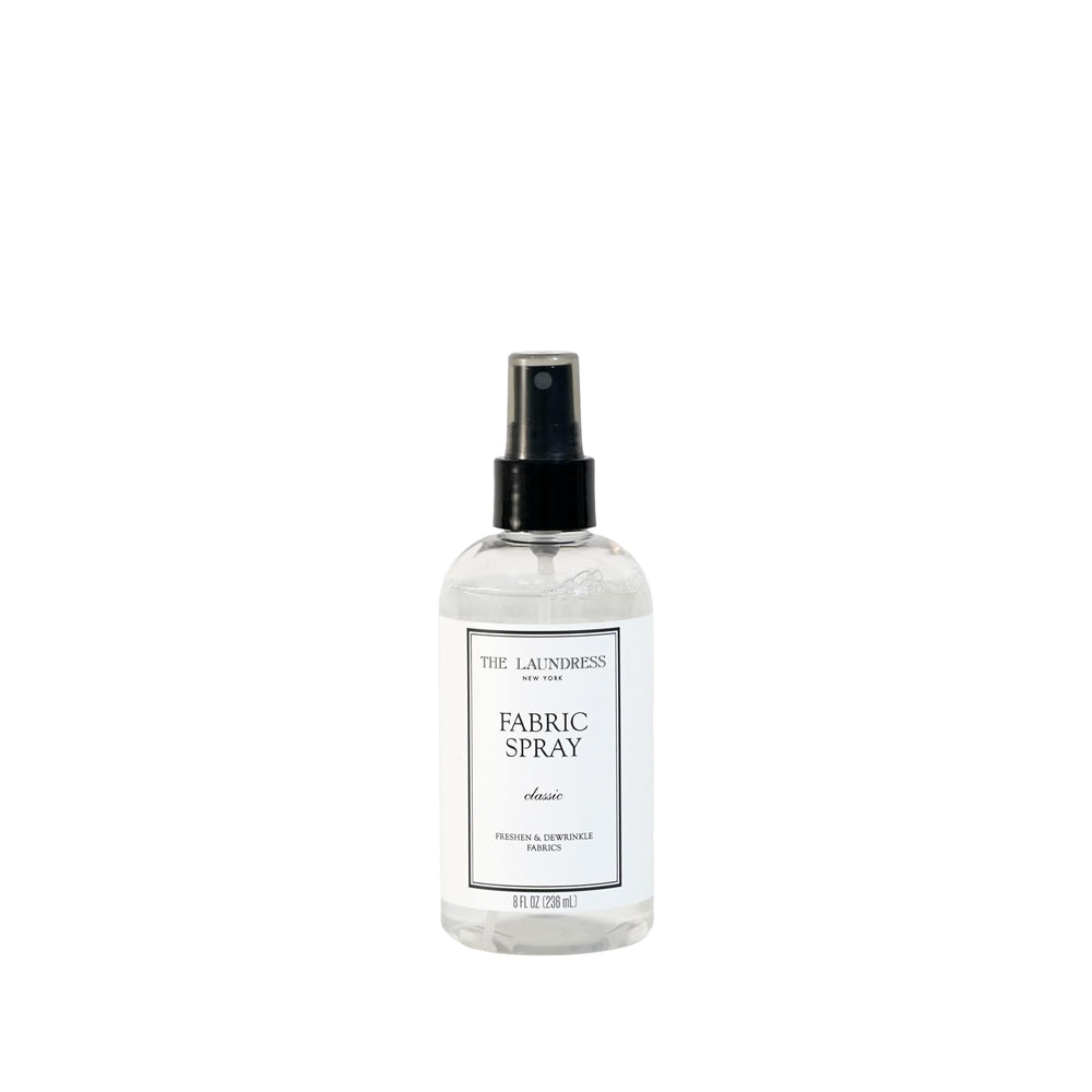 The Laundress front bottle view showing label and elegant packaging benefit: clear product ID