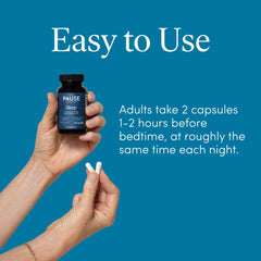 Hand holding The 'Pause Life bottle to show size and portability
